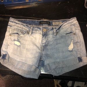 Light wash ripped jean shorts